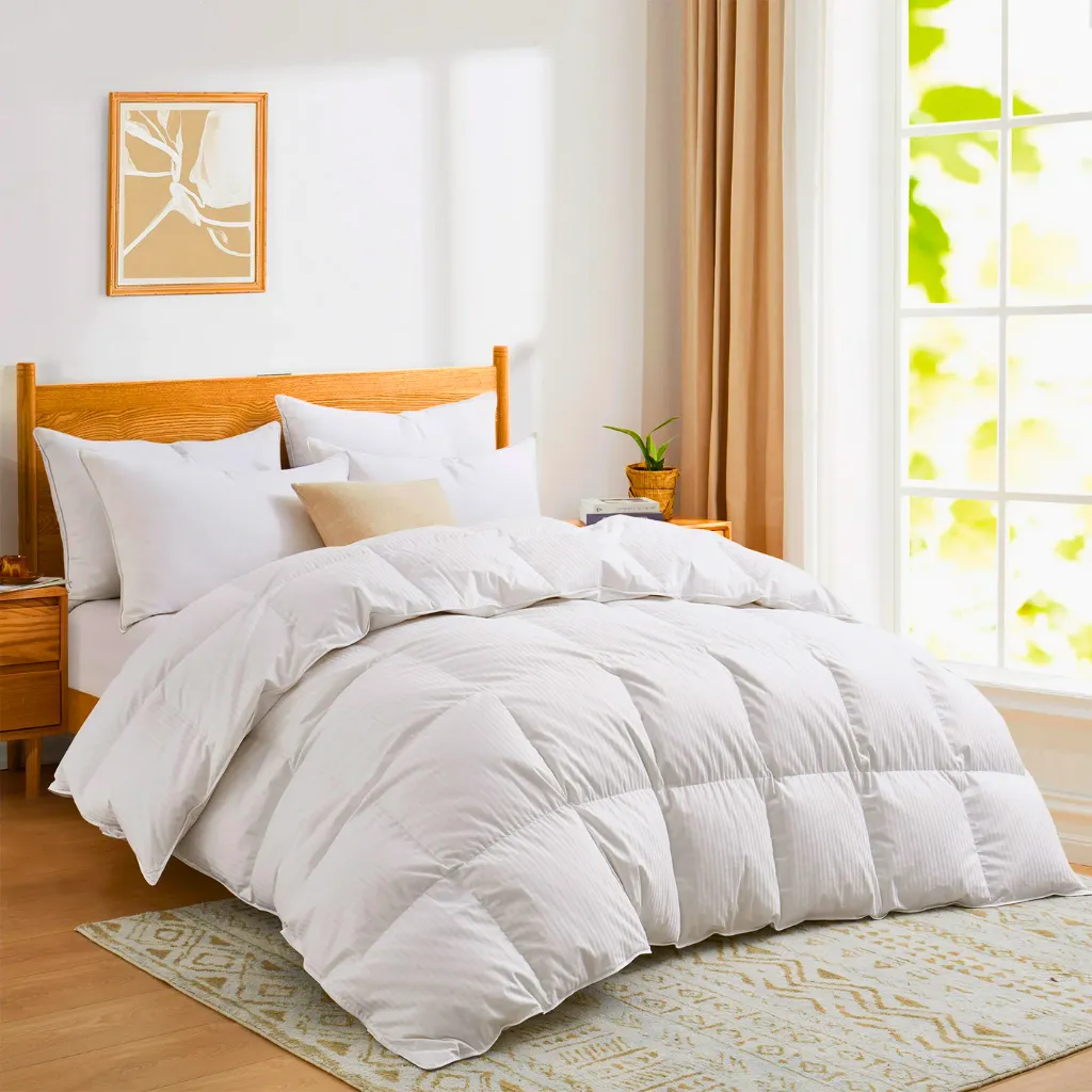 High-loft luxury hotel comforter layered on a pristine white bed